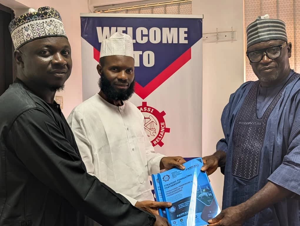 Three representatives presenting the NASSI and Zamkah consulting framework.