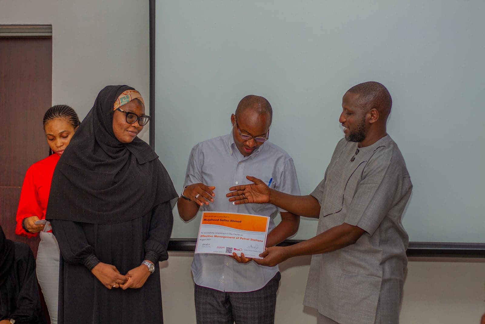 Certificate presentation following a Shafa Energy training session in Kano.