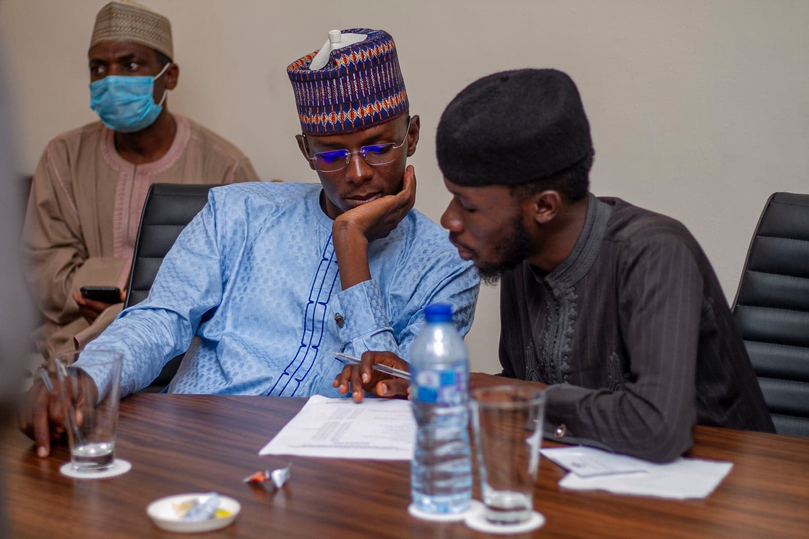 Participants discussing material during a Shafa Energy capacity-development session in Kano.